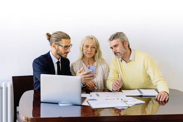 meeting a property manager going over reports with property owners