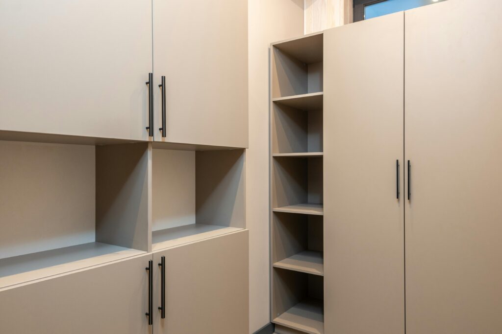 empty light brow cabinets and shelf space