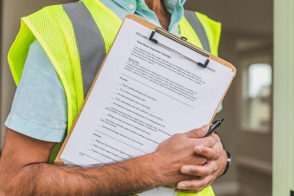 person holding checklist